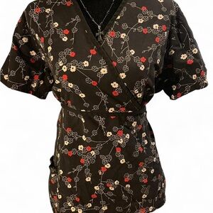 Black Floral Wrap-Style Top with Red & White Blooms
